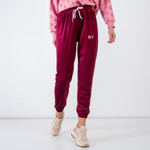Maroon women's sweatpants with embroidered inscription - Clothing