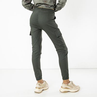 Tamsiai žalios moteriškos kelnės su kišenėmis - Drabužiai