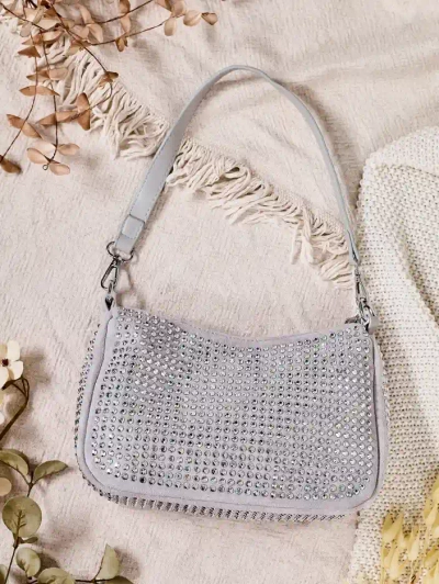 Royalfashion Маленькая женская сумка с заклепками