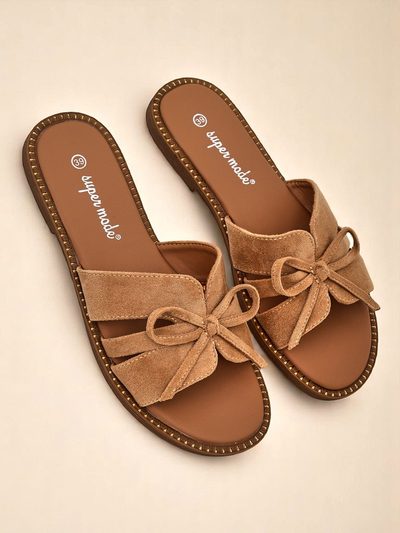 Royalfashion Женские тапочки на плоской подошве с бантом Gerber