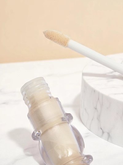 Skystas veido švytėjimo suteikiantis highlighteris su šepetėliu Pearl Glow