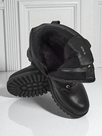 Artemisia Nero leather ankle boots with a round toe, zipper and gold buckle