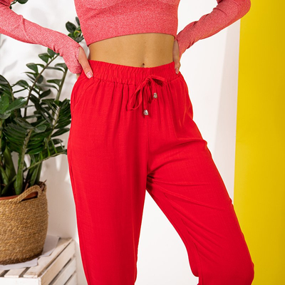 Женские брюки красного цвета