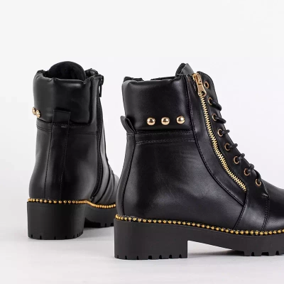 OUTLET Juodos spalvos moteriškos rankinės su auksiniais kamuoliukais Komilso - Avalynė