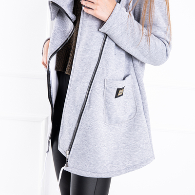 Серое женское пальто с асимметричной молнией