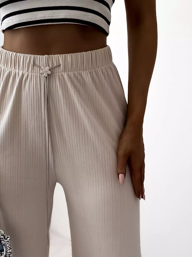 Бежевые женские широкие ребристые брюки - Одежда