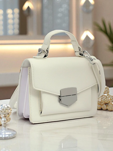 Royalfashion Moteriška vokelio formos rankinė su rankena Amalthea Avorio