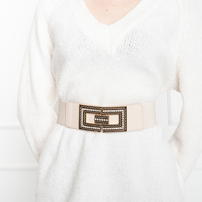 Бежевый эластичный ремень с золотой пряжкой со стразами