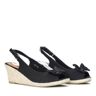 OUTLET Черные босоножки на танкетке с бантом Belva - Обувь