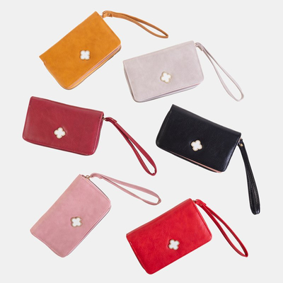 Светло-серый женский кошелек с отделкой