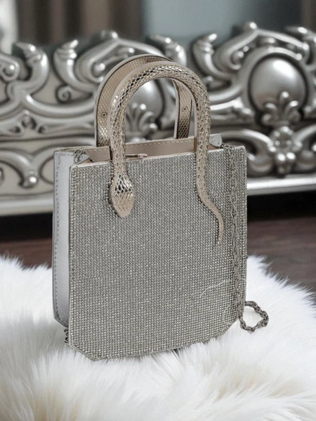 Royalfashion Kopertowa torebka damska z cyrkoniami i r
ączkami w
ę
ża Snake Glam