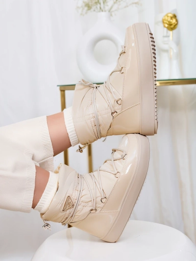 Royalfashion Женские сапоги-слипы a'la snow boots бежевого цвета Vevnose