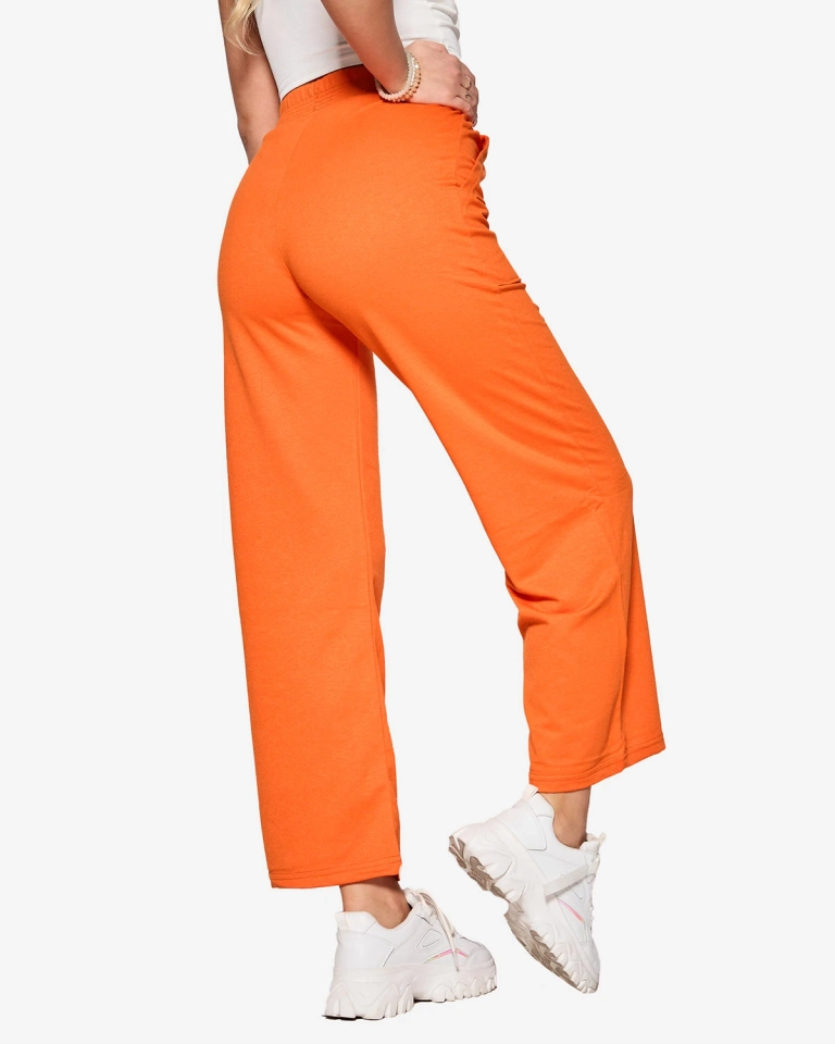 Moteriškos oranžinės plačios sportinės kelnės - Apranga