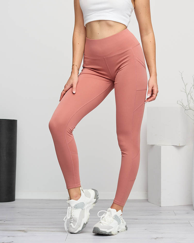 Sportinės tamsiai rožinės spalvos moteriškos antblauzdžiai su kišenėmis - Drabužiai