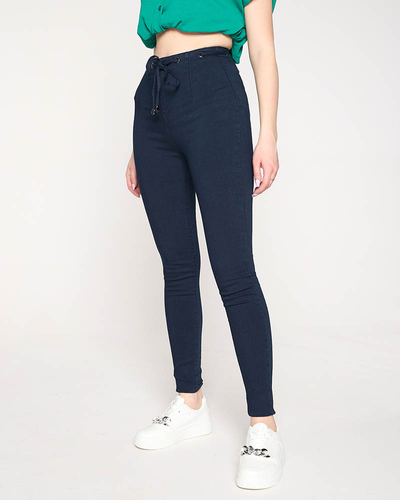 Tamsiai mėlyni moteriški siauri džinsai su dekoratyviniu dirželiu - Drabužiai