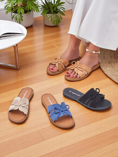 Royalfashion Женские шлепанцы на плоской подошве с бантом Gerber