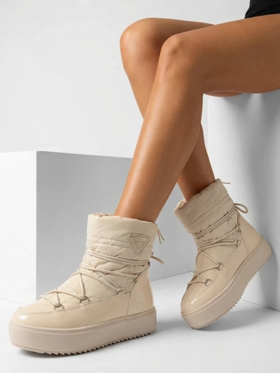 Royalfashion Женские сапоги-слипы a'la snow boots бежевого цвета Vevnose