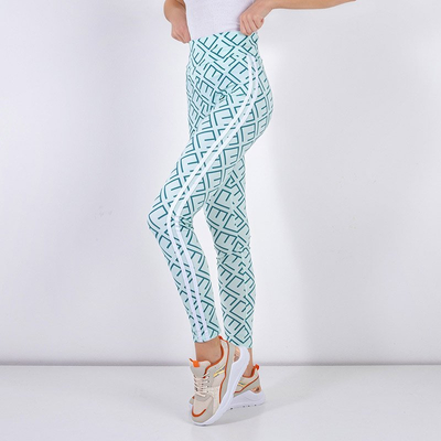 Мятные женские леггинсы с геометрическим принтом - Одежда
