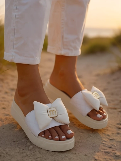 Royalfashion Женские шлепанцы на платформе с бантиком Mivo Jump
