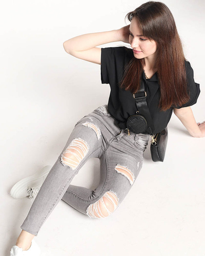 Серые рваные джинсы женские - Одежда