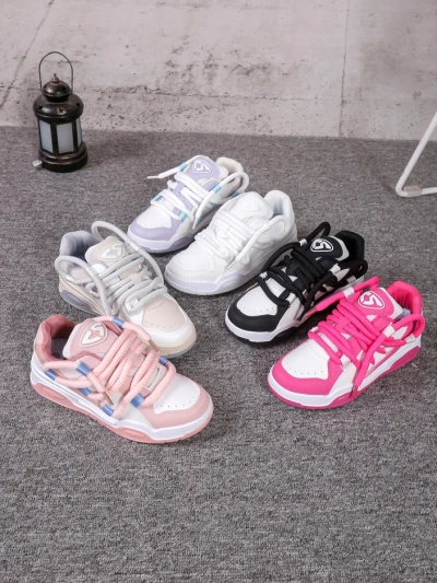 Royalfashion moterų sportiniai sneakeriai su dekoratyviais raišteliais Clesiv