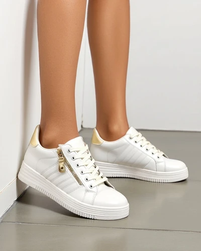 Royalfashion moteriški sportiniai bateliai su dekoratyvine užtrauktuku Evrove