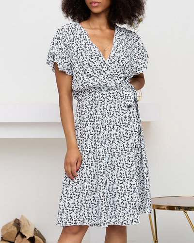 Moteriška balta platėjančių gėlių suknelė - Drabužiai