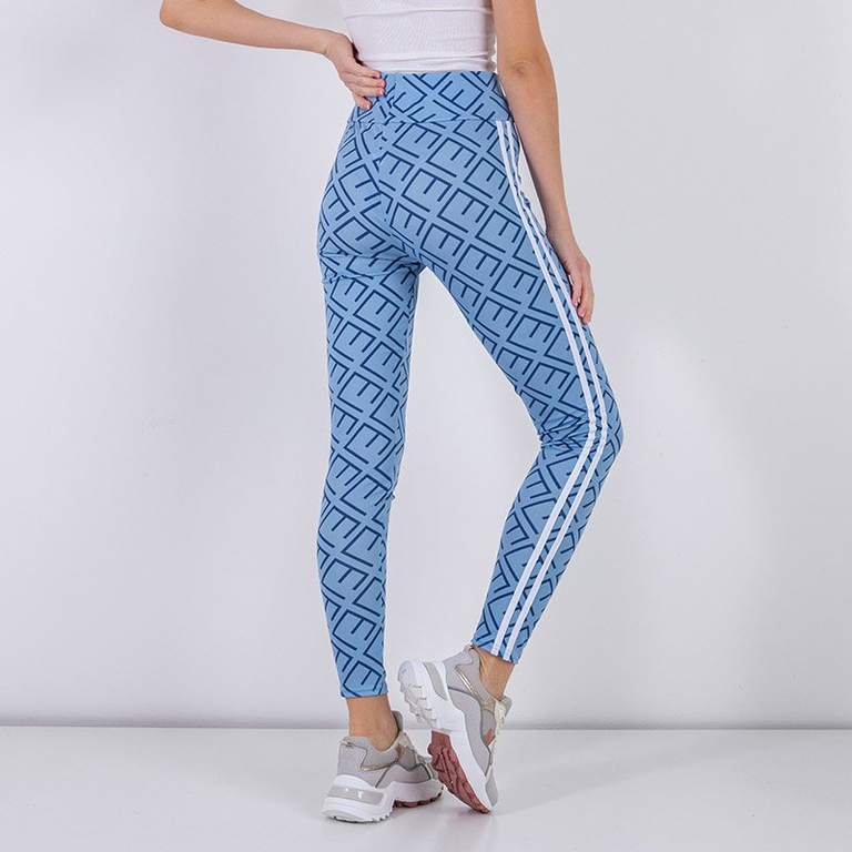 Голубые женские леггинсы с геометрическим принтом - Одежда