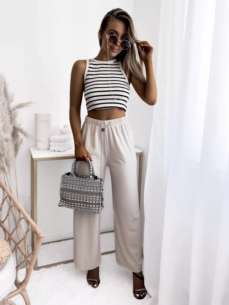 Бежевые женские широкие ребристые брюки - Одежда