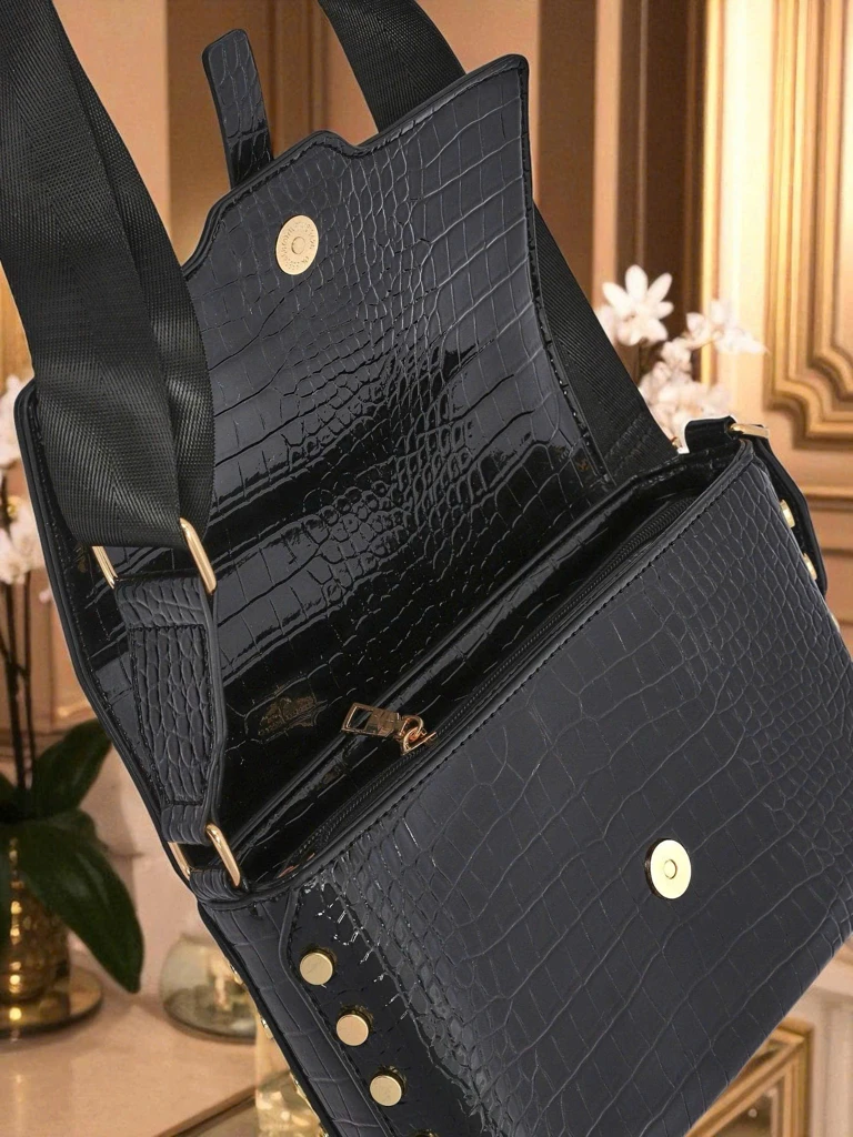 Royalfashion Błyszcząca mała torebeczka Nexa Vale z eko sk
rki