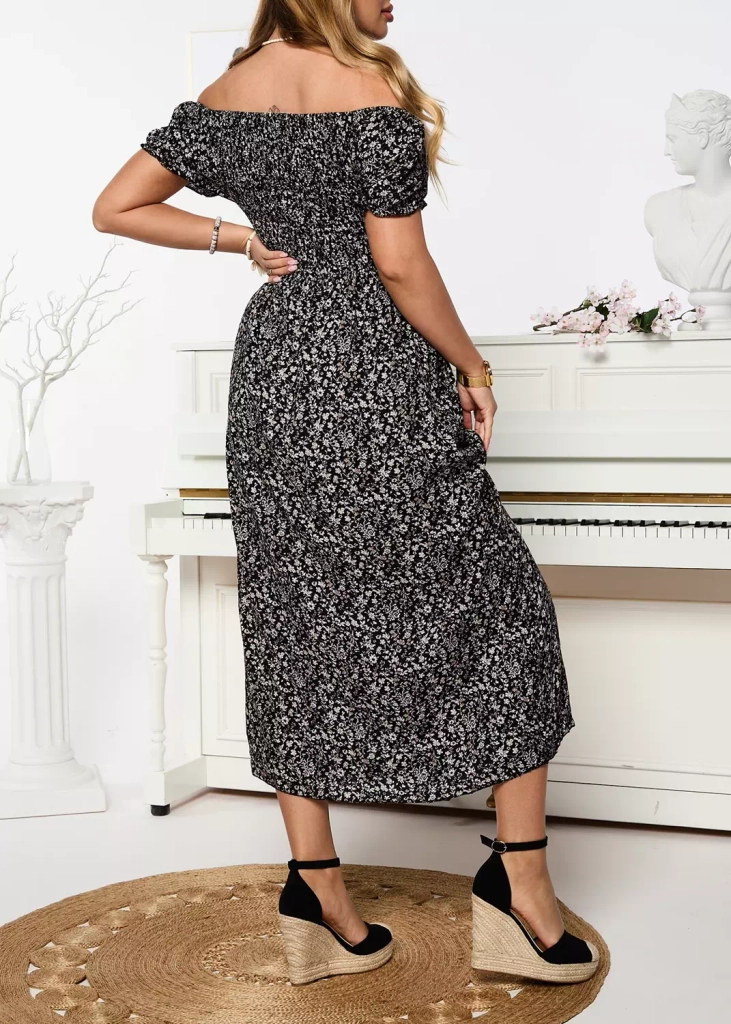 Raštuota juoda moteriška maksi suknelė Apranga