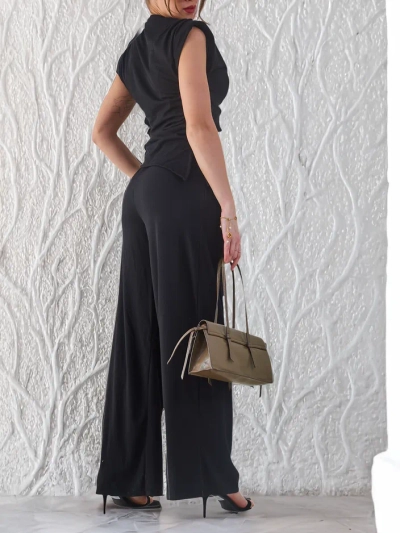 Royalfashion Moteriškas raštuotas komplektas su asimetriška viršūne, be rankovių ir plačiomis kelnėmis