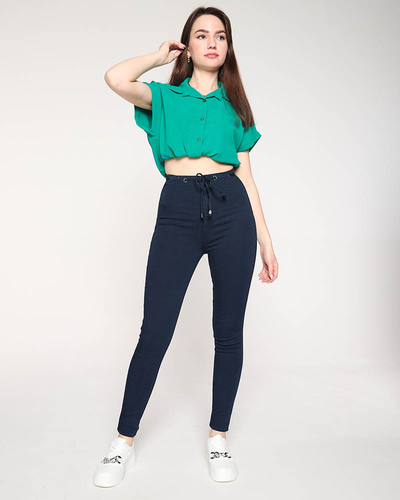 Tamsiai mėlyni moteriški siauri džinsai su dekoratyviniu dirželiu - Drabužiai