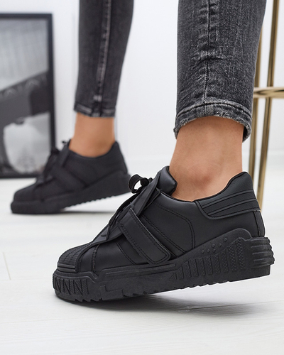 Juodi moteriški sportiniai bateliai su guminiais intarpais Inika - Avalynė