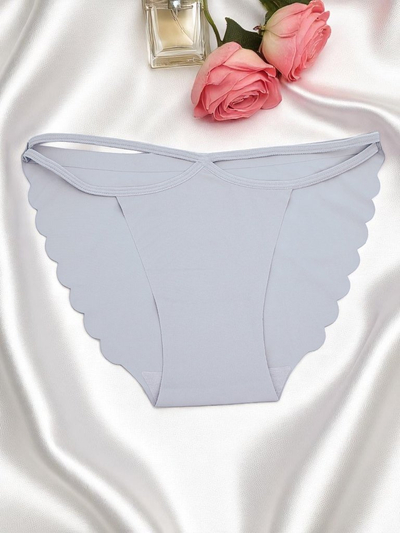 Royalfashion Lazeriu pjaustytos moteriškos kelnaitės su dekoratyvinėmis juostelėmis Edge Chic