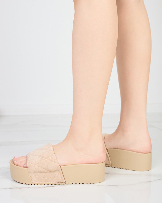 Бежевые стеганные шлепанцы на платформе Koriner