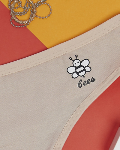 Smėlio spalvos medvilnės moteriškos vienspalvės stringai su raštu - Apatiniai rūbai