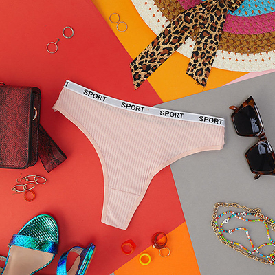 Светло-розовые женские трусики-стринги в рубчик - Нижнее белье