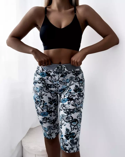 Raštuoti moteriški 3/4 šortai turkio baltumo PLUS DYDIS - Drabužiai