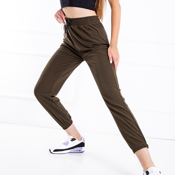 Žalios moteriškos sportinės kelnės su užrašu - Drabužiai