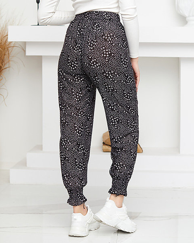 Juodos rašto erdvios moteriškos kelnės - Drabužiai