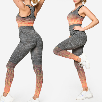 Pilkas moteriškas sportinis komplektas su oranžiniais intarpais - Apranga