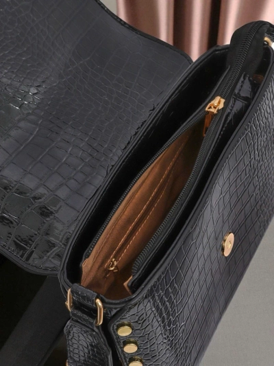 Royalfashion Błyszcząca mała torebeczka Nexa Vale z eko sk
rki