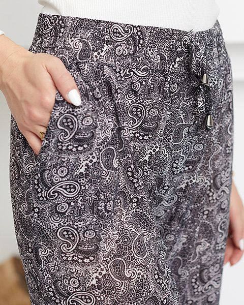 Черно-белые женские брюки с рисунком - Одежда