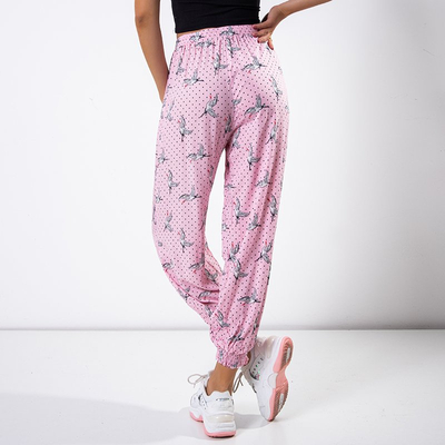 Розовые женские брюки с принтом