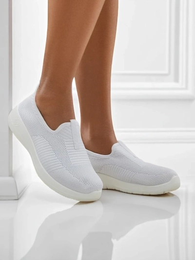 Callista White Slip-Ons: Breathable and Flat Out Fly