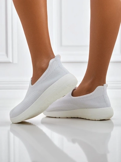 Callista White Slip-Ons: Breathable and Flat Out Fly
