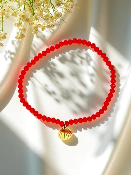 Royalfashion Moteriška apyrankė su kriauklės pakabuku