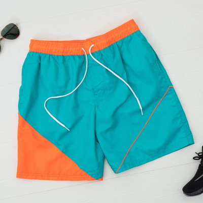 Бирюзово-оранжевые мужские спортивные шорты