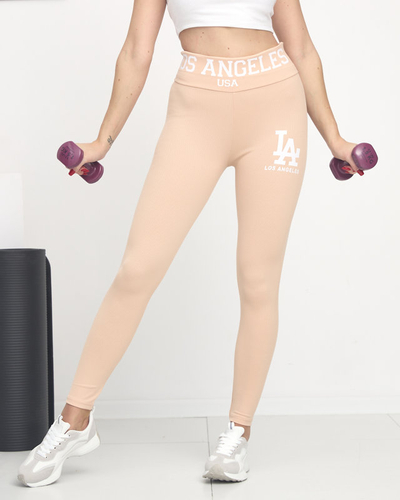 Пудрово-розовые леггинсы в рубчик с белой надписью